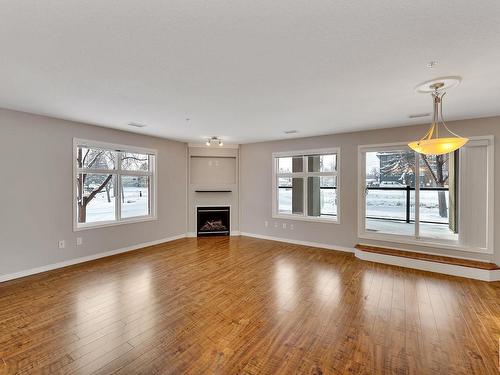 126 7909 71 Street, Edmonton, AB - Indoor Photo Showing Living Room With Fireplace