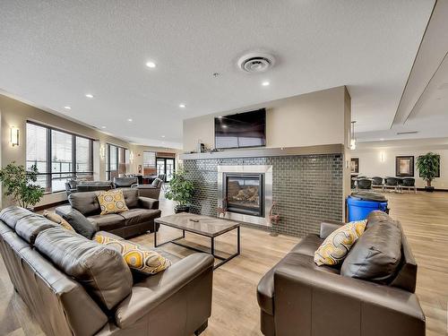 126 7909 71 Street, Edmonton, AB - Indoor Photo Showing Living Room With Fireplace