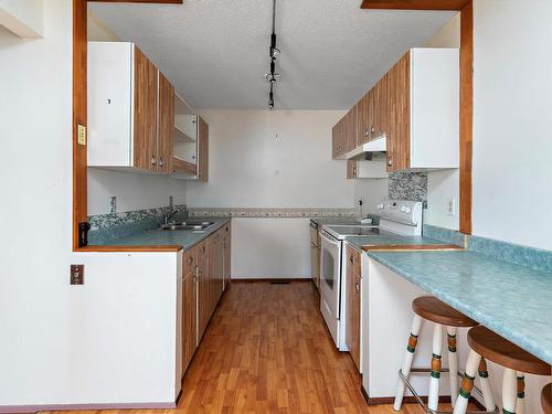 10314 158 Avenue, Edmonton, AB - Indoor Photo Showing Kitchen With Double Sink