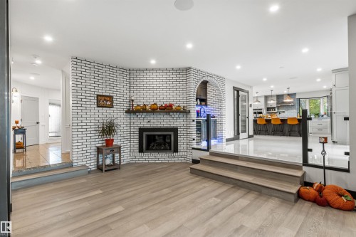 116 Windermere Drive, Edmonton, AB - Indoor Photo Showing Other Room With Fireplace