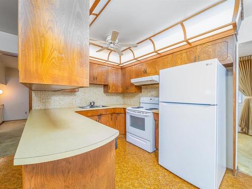 2011 89 Street, Edmonton, AB - Indoor Photo Showing Kitchen With Double Sink