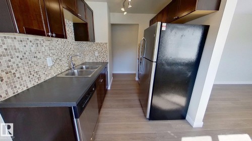 202 10125 83 Avenue, Edmonton, AB - Indoor Photo Showing Kitchen With Double Sink