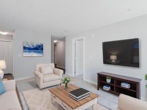 117 11511 27 Avenue, Edmonton, AB - Indoor Photo Showing Living Room