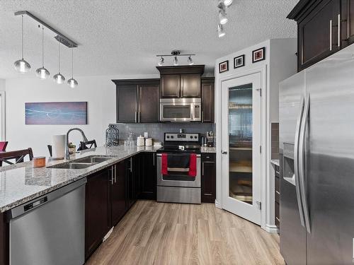 21979 90 Avenue, Edmonton, AB - Indoor Photo Showing Kitchen With Double Sink With Upgraded Kitchen