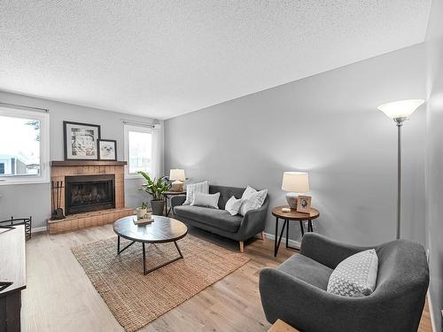 18036 96 Avenue, Edmonton, AB - Indoor Photo Showing Living Room With Fireplace