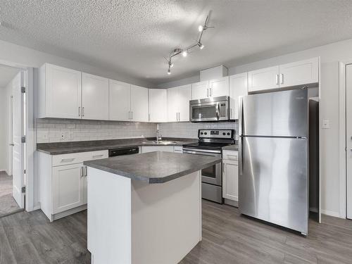 340 301 Clareview Station Drive, Edmonton, AB - Indoor Photo Showing Kitchen With Stainless Steel Kitchen With Double Sink