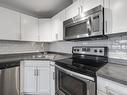 340 301 Clareview Station Drive, Edmonton, AB  - Indoor Photo Showing Kitchen With Stainless Steel Kitchen With Double Sink 