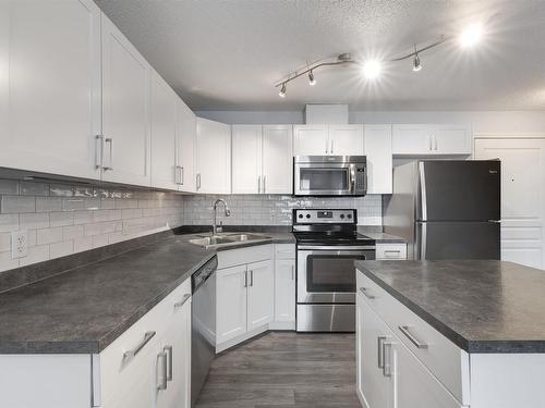 340 301 Clareview Station Drive, Edmonton, AB - Indoor Photo Showing Kitchen With Stainless Steel Kitchen With Double Sink