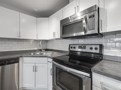 340 301 Clareview Station Drive, Edmonton, AB - Indoor Photo Showing Kitchen With Stainless Steel Kitchen With Double Sink