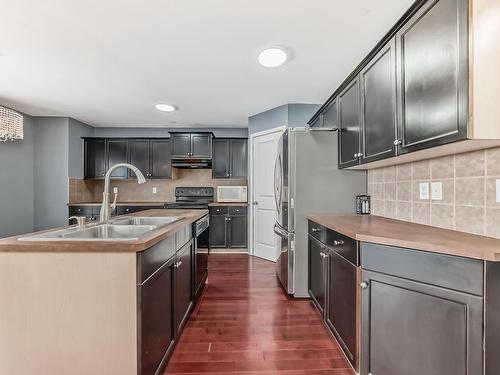 13906 146 Avenue Nw, Edmonton, AB - Indoor Photo Showing Kitchen With Double Sink