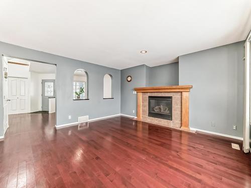 13906 146 Avenue Nw, Edmonton, AB - Indoor Photo Showing Living Room With Fireplace