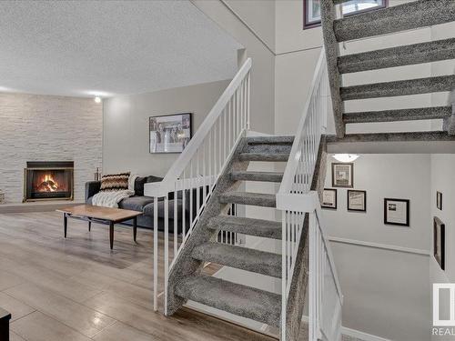 17211 60 Avenue, Edmonton, AB - Indoor Photo Showing Other Room With Fireplace