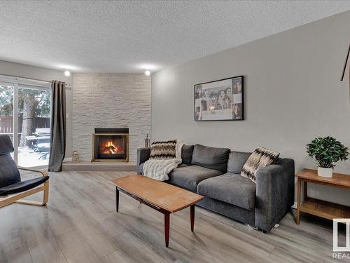 17211 60 Avenue, Edmonton, AB - Indoor Photo Showing Living Room With Fireplace