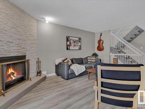 17211 60 Avenue, Edmonton, AB - Indoor Photo Showing Living Room With Fireplace