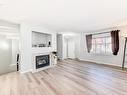 33 12930 140 Avenue, Edmonton, AB  - Indoor Photo Showing Living Room With Fireplace 