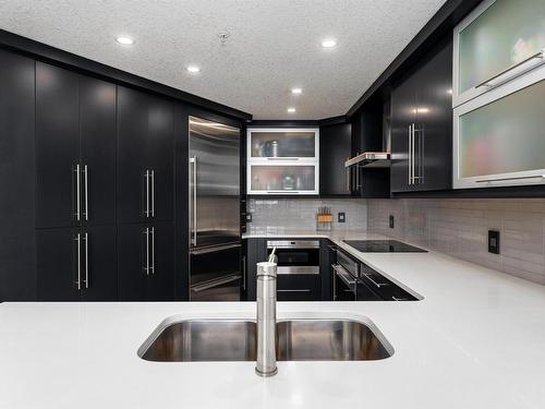 106 9020 Jasper Avenue, Edmonton, AB - Indoor Photo Showing Kitchen With Double Sink