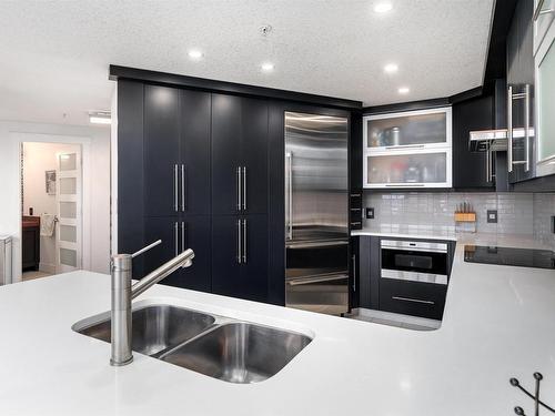 106 9020 Jasper Avenue, Edmonton, AB - Indoor Photo Showing Kitchen With Stainless Steel Kitchen With Double Sink With Upgraded Kitchen