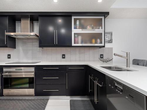 106 9020 Jasper Avenue, Edmonton, AB - Indoor Photo Showing Kitchen With Double Sink With Upgraded Kitchen