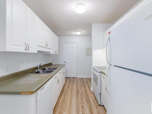 303 11446 40 Avenue, Edmonton, AB - Indoor Photo Showing Kitchen With Double Sink