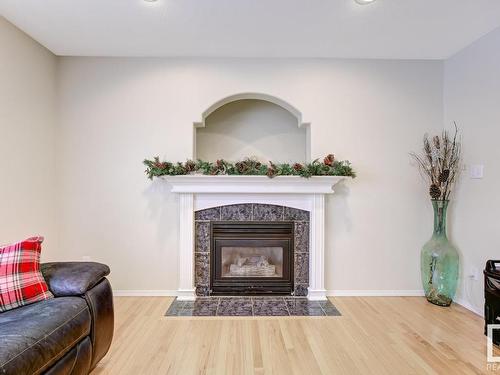 8918 159A Avenue, Edmonton, AB - Indoor Photo Showing Living Room With Fireplace