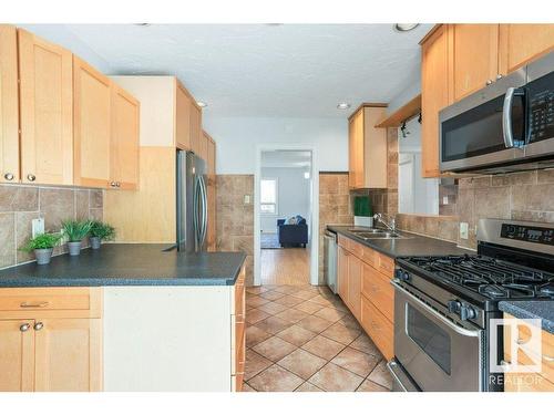 10623 83 Street, Edmonton, AB - Indoor Photo Showing Kitchen With Double Sink