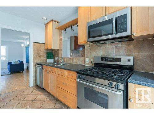 10623 83 Street, Edmonton, AB - Indoor Photo Showing Kitchen With Double Sink