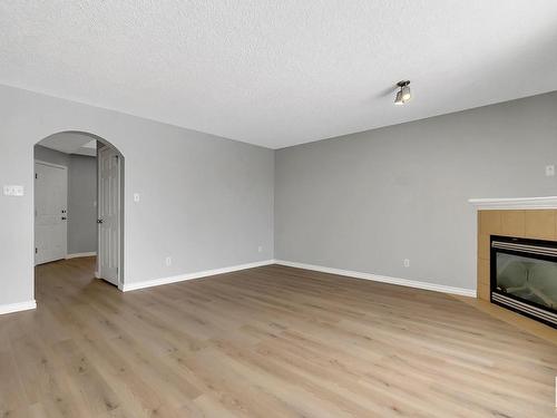 3771 23 Street, Edmonton, AB - Indoor With Fireplace