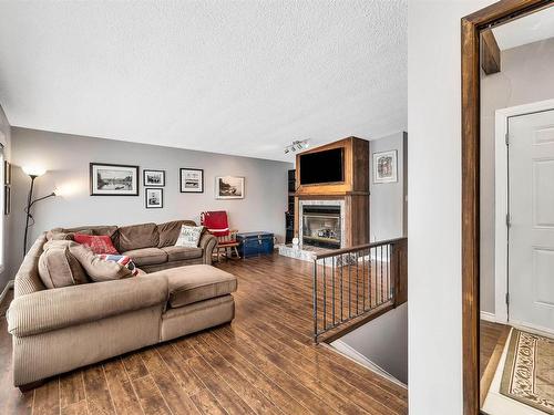 6824 94B Avenue, Edmonton, AB - Indoor Photo Showing Living Room With Fireplace