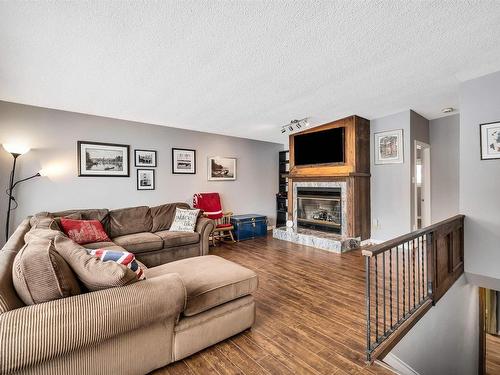 6824 94B Avenue, Edmonton, AB - Indoor Photo Showing Living Room With Fireplace