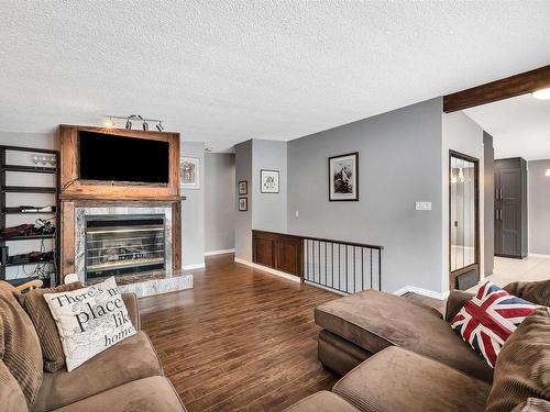 6824 94B Avenue, Edmonton, AB - Indoor Photo Showing Living Room With Fireplace