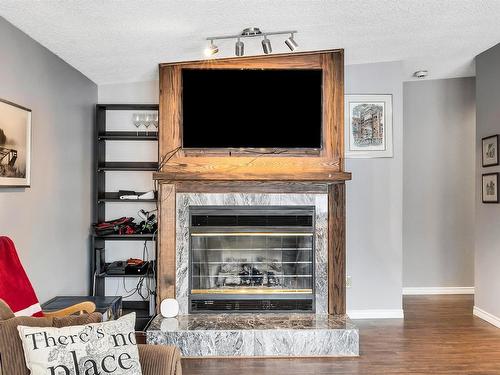 6824 94B Avenue, Edmonton, AB - Indoor Photo Showing Living Room With Fireplace