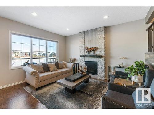 3414 Parker Loop, Edmonton, AB - Indoor Photo Showing Living Room With Fireplace