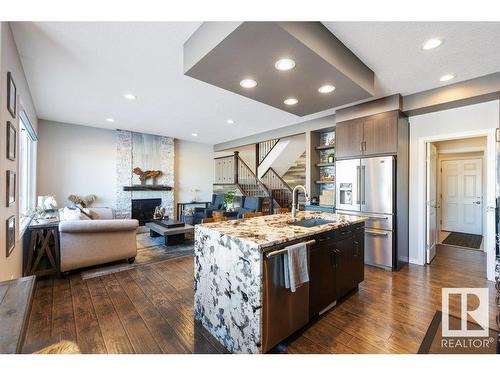 3414 Parker Loop, Edmonton, AB - Indoor Photo Showing Kitchen With Fireplace With Upgraded Kitchen