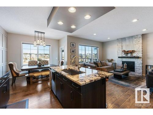 3414 Parker Loop, Edmonton, AB - Indoor Photo Showing Other Room With Fireplace