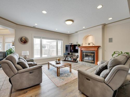 946 Hollingsworth Bend, Edmonton, AB - Indoor Photo Showing Living Room With Fireplace