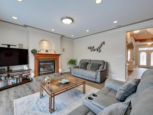 946 Hollingsworth Bend, Edmonton, AB - Indoor Photo Showing Living Room With Fireplace