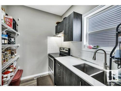 5316 22 Avenue, Edmonton, AB - Indoor Photo Showing Kitchen With Double Sink