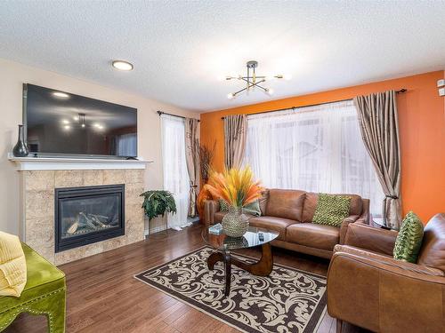 10335 160 Street, Edmonton, AB - Indoor Photo Showing Living Room With Fireplace