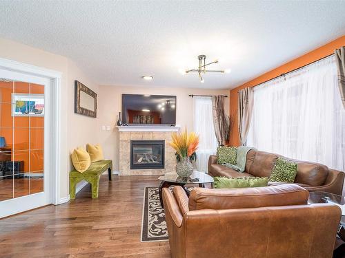 10335 160 Street, Edmonton, AB - Indoor Photo Showing Living Room With Fireplace