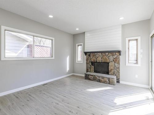 16723 98 Street, Edmonton, AB - Indoor Photo Showing Living Room With Fireplace