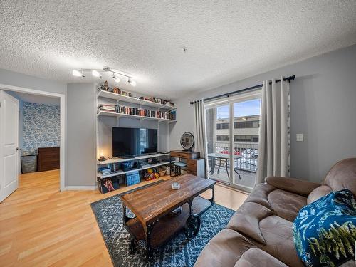 214 10535 122 Street, Edmonton, AB - Indoor Photo Showing Living Room