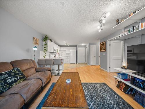 214 10535 122 Street, Edmonton, AB - Indoor Photo Showing Living Room