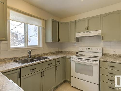 12042 65 Street, Edmonton, AB - Indoor Photo Showing Kitchen With Double Sink