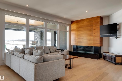 B 25056 Twp Road 492, Rural Leduc County, AB - Indoor Photo Showing Living Room With Fireplace