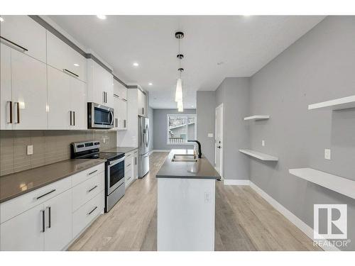 12116 80 Street, Edmonton, AB - Indoor Photo Showing Kitchen With Stainless Steel Kitchen With Double Sink With Upgraded Kitchen