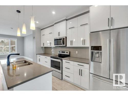 12116 80 Street, Edmonton, AB - Indoor Photo Showing Kitchen With Stainless Steel Kitchen With Double Sink With Upgraded Kitchen