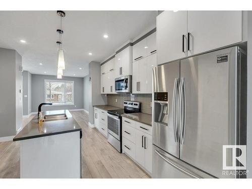 12116 80 Street, Edmonton, AB - Indoor Photo Showing Kitchen With Stainless Steel Kitchen With Double Sink With Upgraded Kitchen