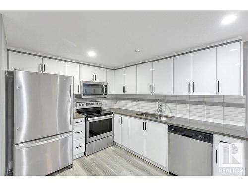 12116 80 Street, Edmonton, AB - Indoor Photo Showing Kitchen With Stainless Steel Kitchen With Double Sink