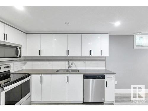 12116 80 Street, Edmonton, AB - Indoor Photo Showing Kitchen With Stainless Steel Kitchen With Double Sink