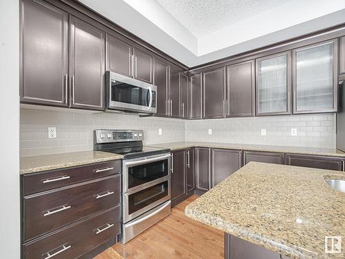 5911 168 Avenue, Edmonton, AB - Indoor Photo Showing Kitchen With Upgraded Kitchen